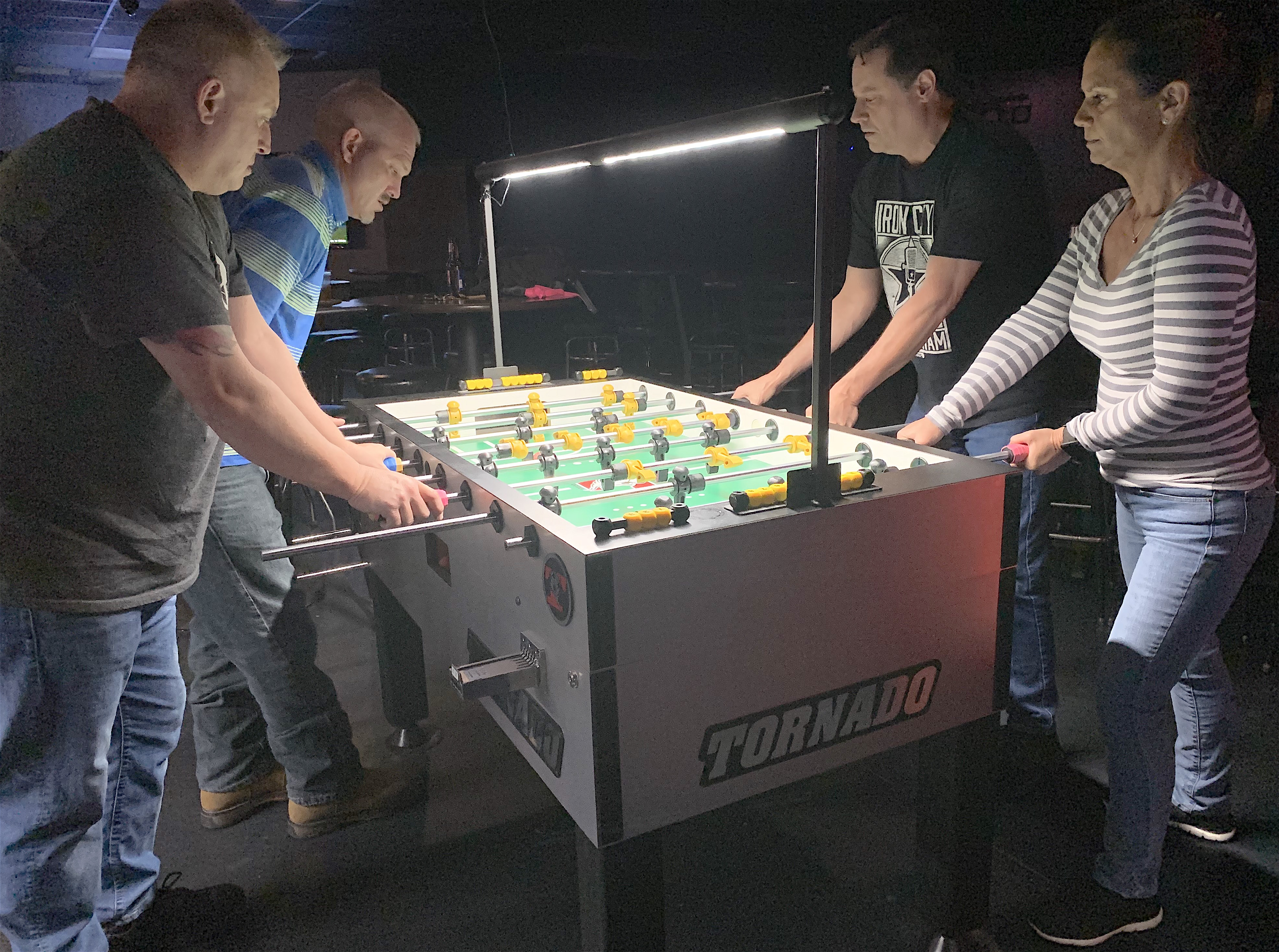 Pictured is Chuck Shikle & Jeremy Monroe vs James Porter & Cheryl Lowe during 2019 foosball tournament action at Madison Station in North Alabama.