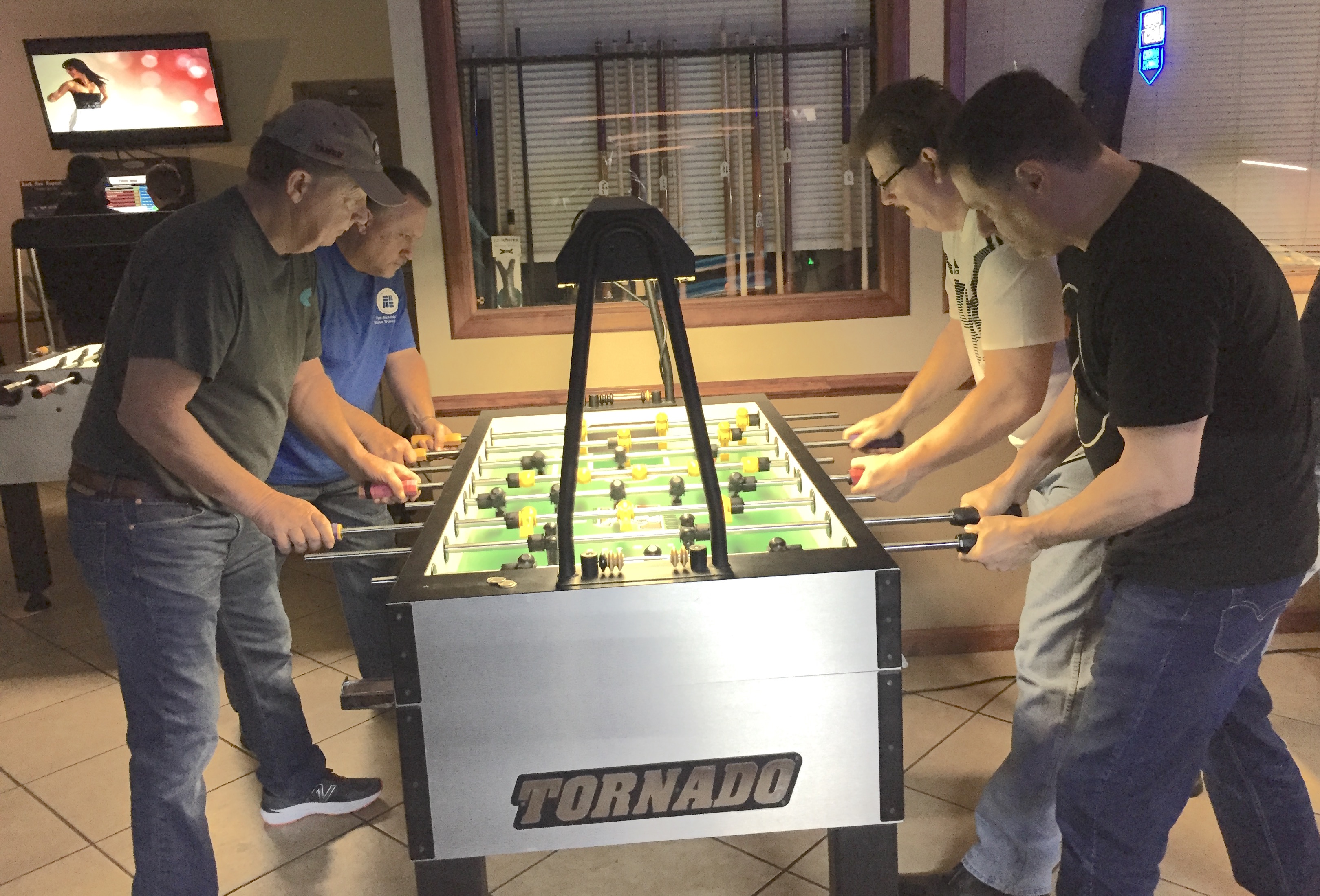 Pictured is foosball tournament action at 6 Pockets Bar & Billiards in Decatur,AL.