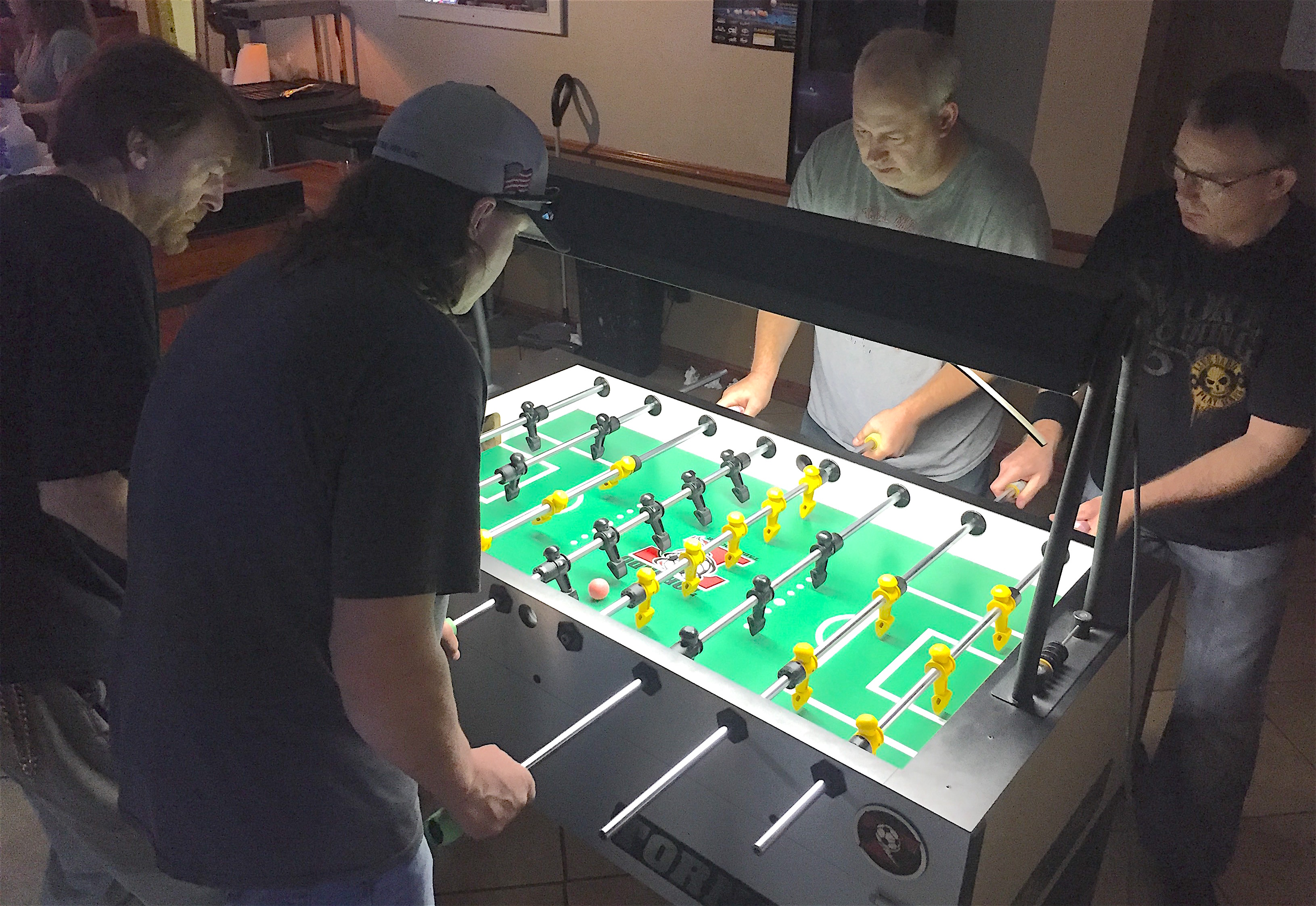 A match for 2nd place or better of open doubles competition at the North Alabama Open foosball tournament held at 6 Pockets Bar & Billiards in Decatur,AL., shown are players Todd Brooks & Bruce Stancil vs Mickey Munger & Wayne Patrick.