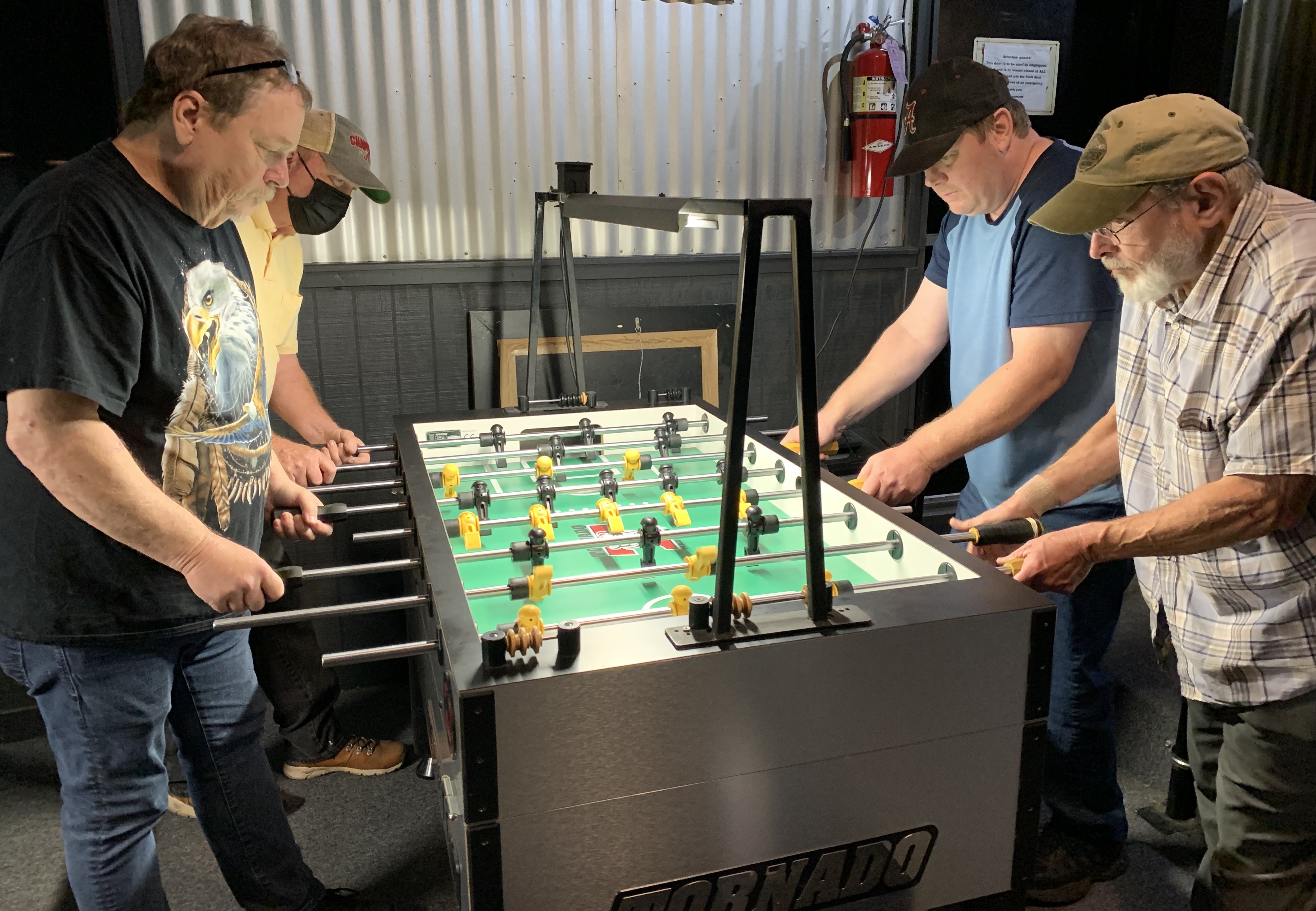 Foosball players in action at Bumpers Billiards in Hoover,AL., Birmingham area foosball players Scotty Scott, Mike Camp, Dale Moore, & Jim Eubank.