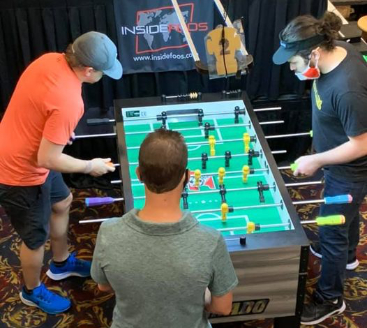 Cullman, Alabama's foosball player, Stephen Darby, is shown on the left while competing during the championship match of Amateur Singles at the 