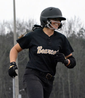 A Cullman Times photo of Claire Jenkins circling the bases after her grand-slam homerun hit vrs area foe Austin HS on 3-12-15